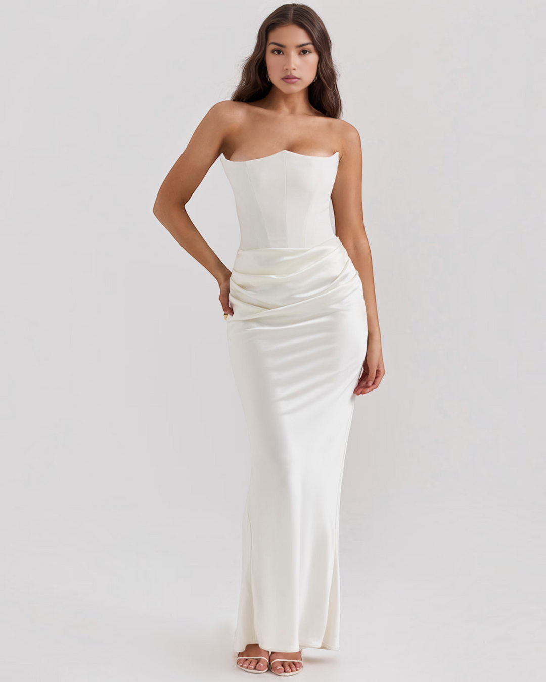 Luna Moda Leilani white strapless evening gown with a structured bodice and elegant side-draped waist detail.