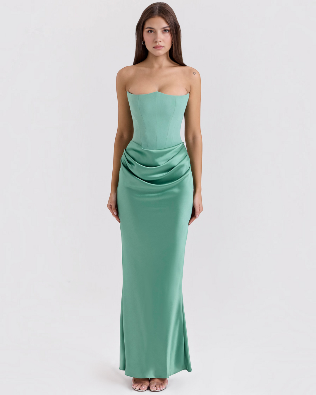 Luna Moda mint green strapless satin gown with a corset-style bodice and draped waist detail on a model