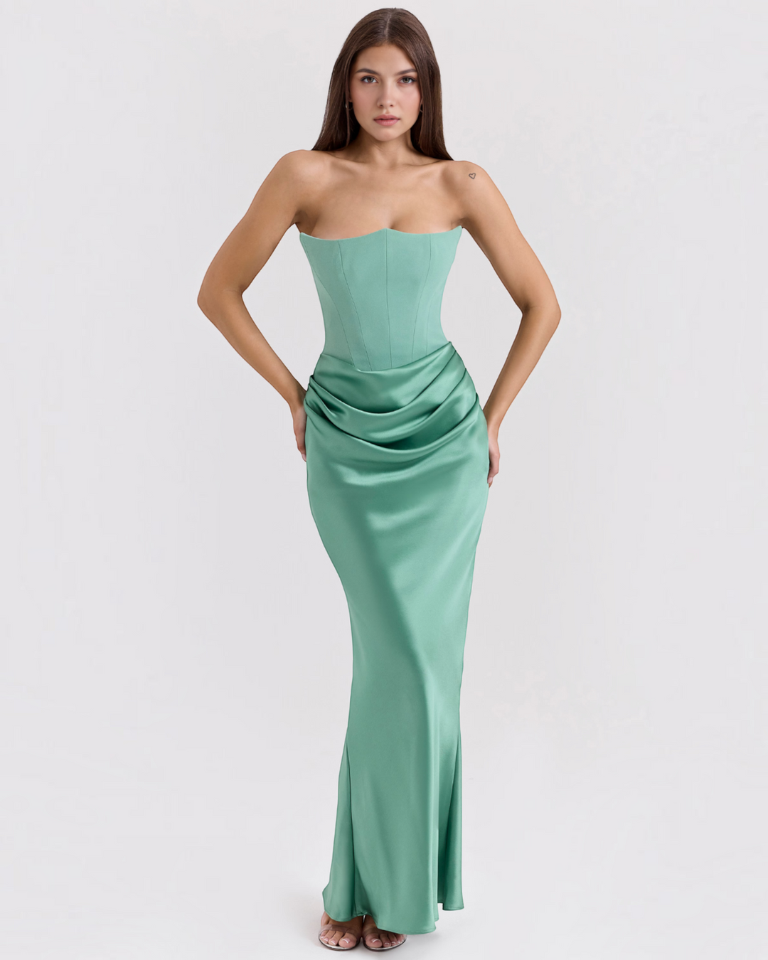 Luna Moda Serene mint green satin strapless corset dress with a draped waist on a model against a white background
