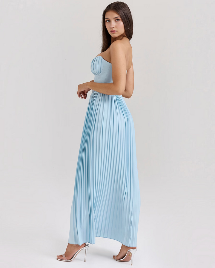 Luna Moda sky blue strapless midi dress with a structured bodice and pleated skirt worn by a model in heels