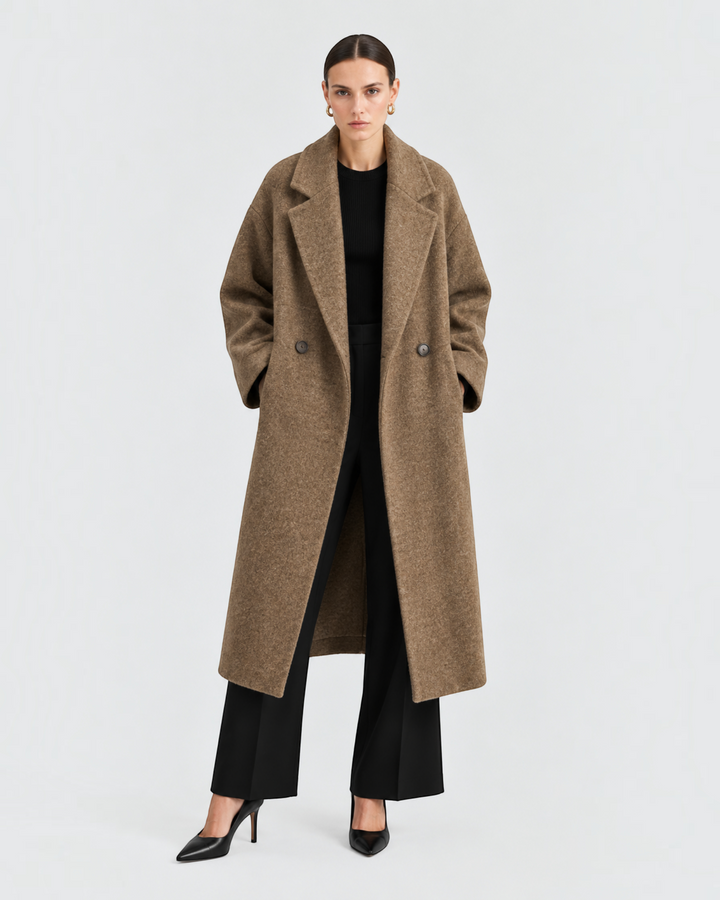 Luna Moda long brown wool coat with wide lapels and pockets worn by a model in a black outfit