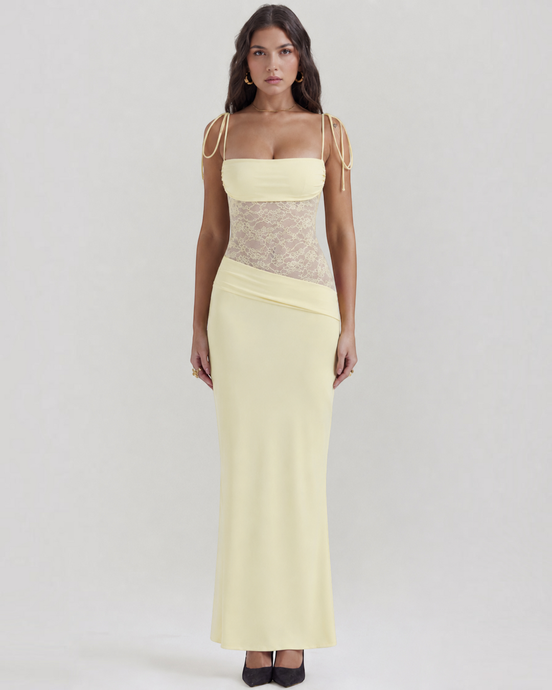 Luna Moda Giulia cream maxi dress with spaghetti straps and sheer lace waist detail worn by a model