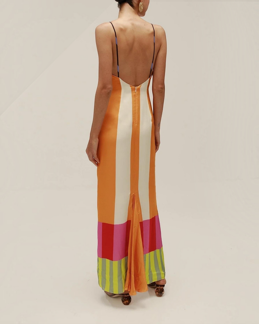 Luna Moda Paloma maxi dress with vibrant geometric stripes, thin straps, open back, and back slit in a linen blend.