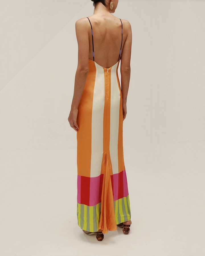 Luna Moda Paloma maxi dress with vibrant geometric stripes, thin straps, open back, and back slit in a linen blend.