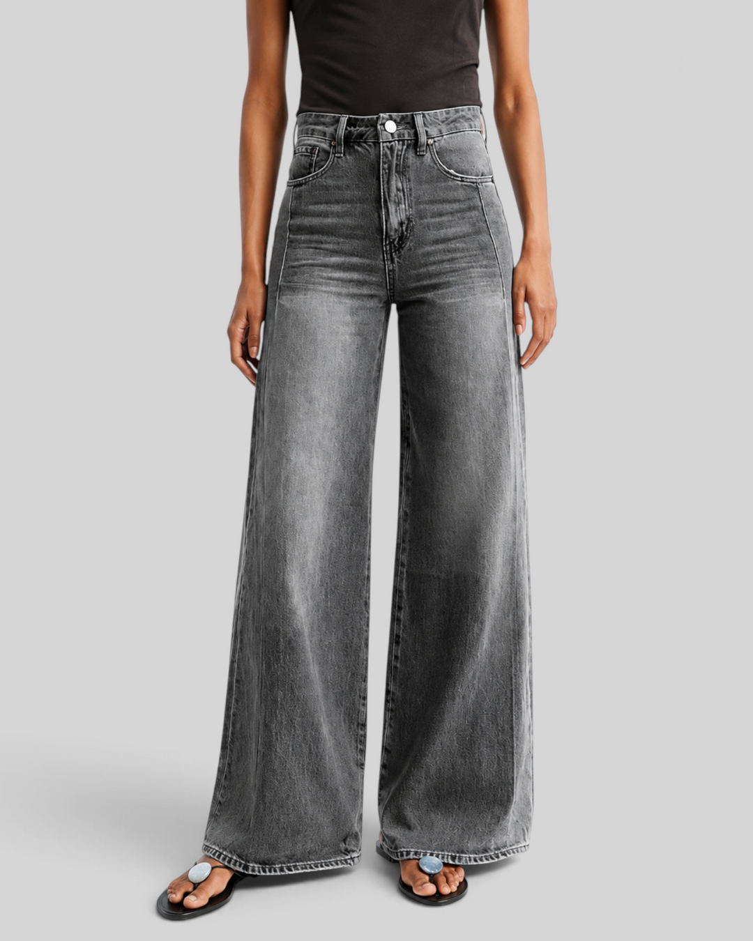 Luna Moda high-waisted wide-leg jeans in washed grey denim worn by a model with a black top