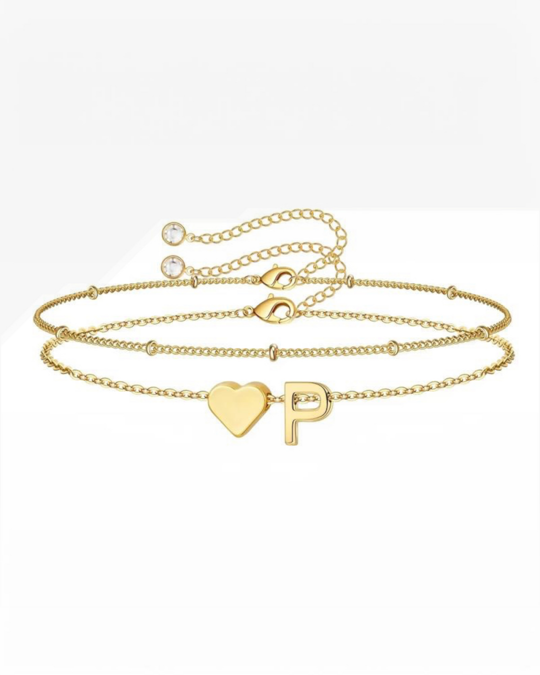 Luna Moda gold double chain bracelet featuring a minimalist heart charm and a personalized letter initial