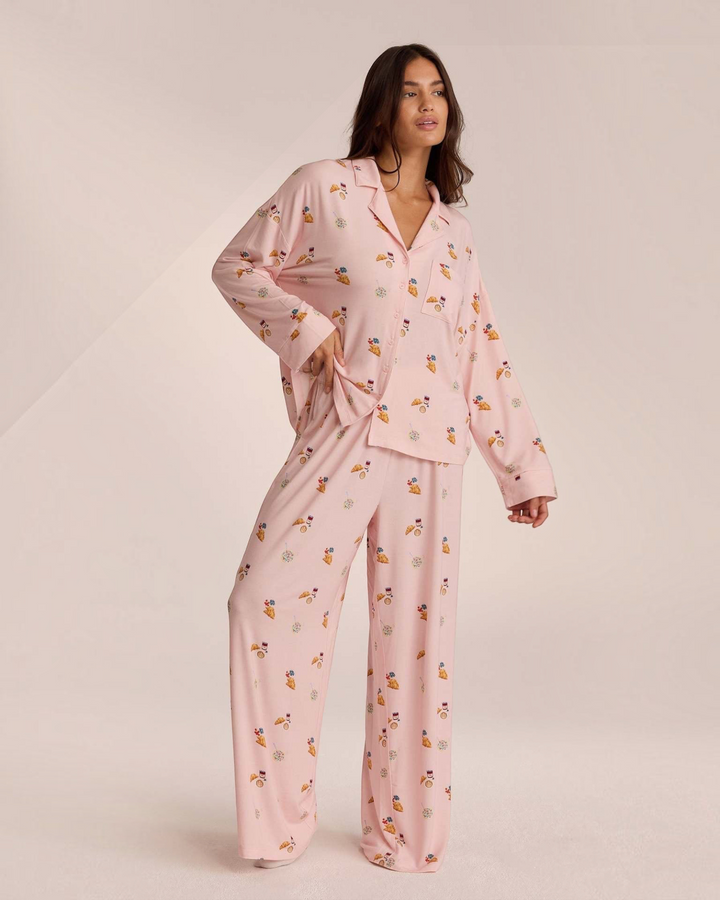 Luna Moda pink button-up pajama set with breakfast-themed print, featuring a relaxed shirt and wide-leg trousers.