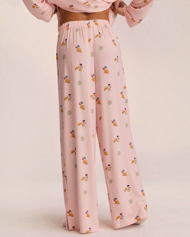 Luna Moda pink wide-leg pajama pants with breakfast-themed print and elastic waistband, back view