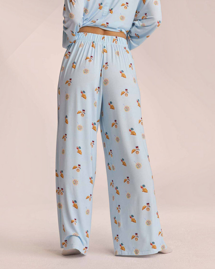 Luna Moda light blue pajama pants with breakfast print, featuring a wide-leg fit and elastic waistband.