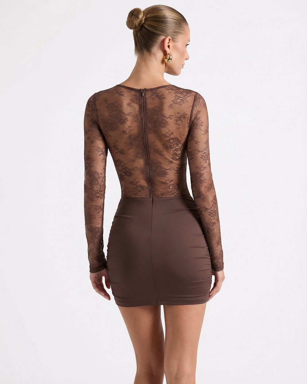 Luna Moda brown mini dress with long lace sleeves and a sheer bodice, back view on a model with a hair bun.