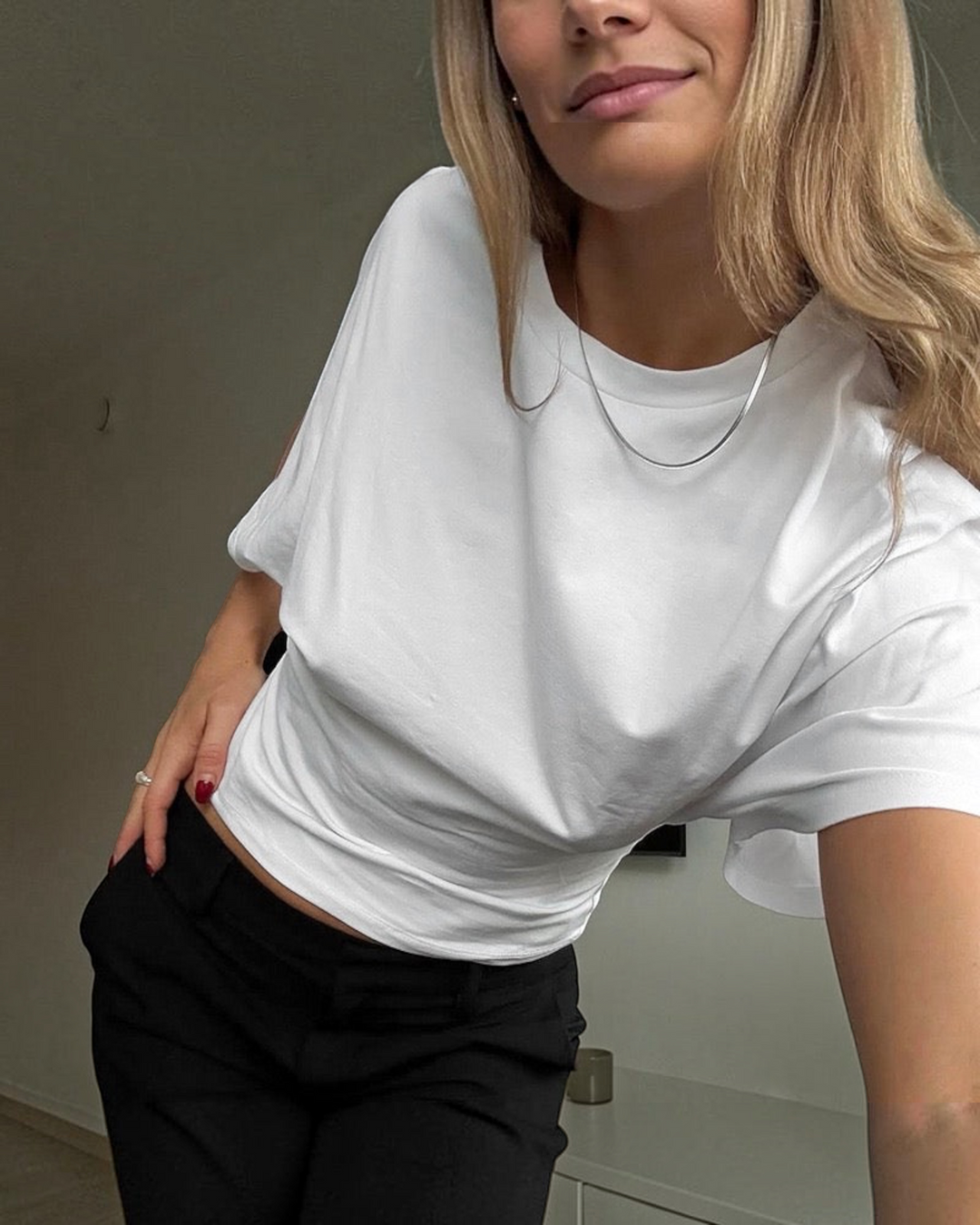 Luna Moda Stella white relaxed fit t-shirt with short sleeves worn by a woman with a silver necklace