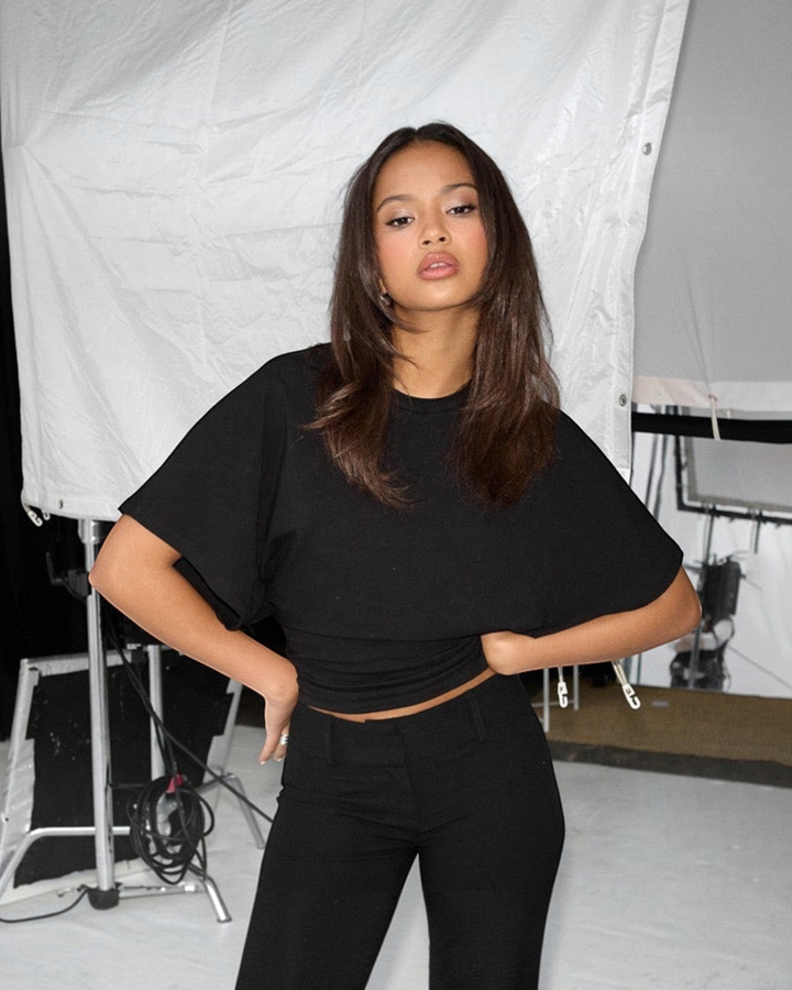 Luna Moda Stella black relaxed fit t-shirt worn by a model in a studio setting with soft breathable fabric