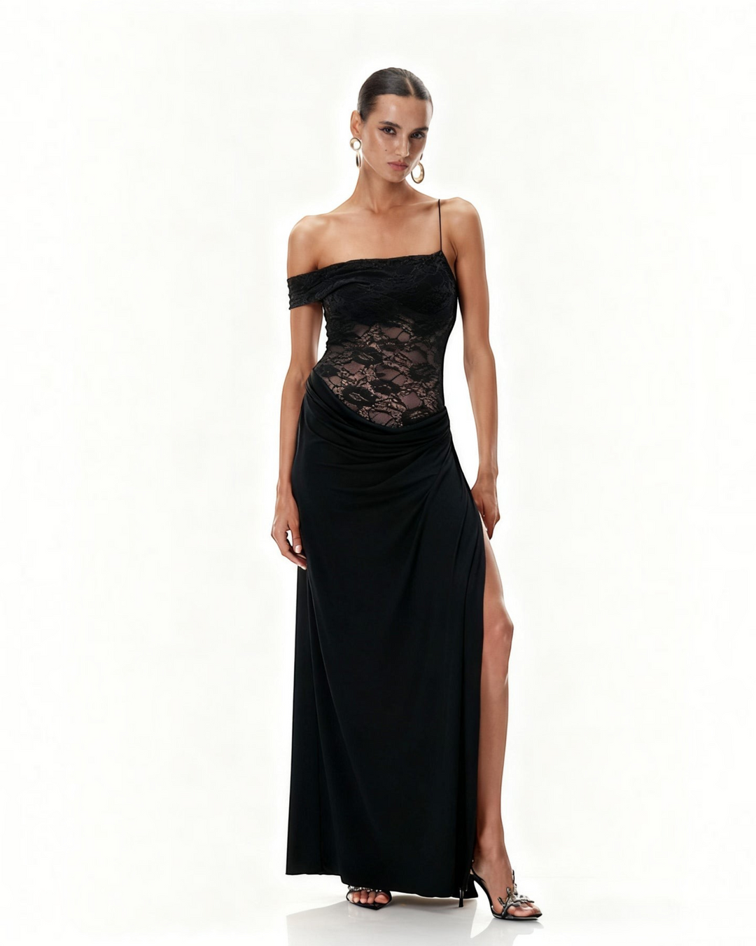 Luna Moda black one-shoulder maxi dress with a semi-sheer lace bodice, draped skirt, and high thigh slit.