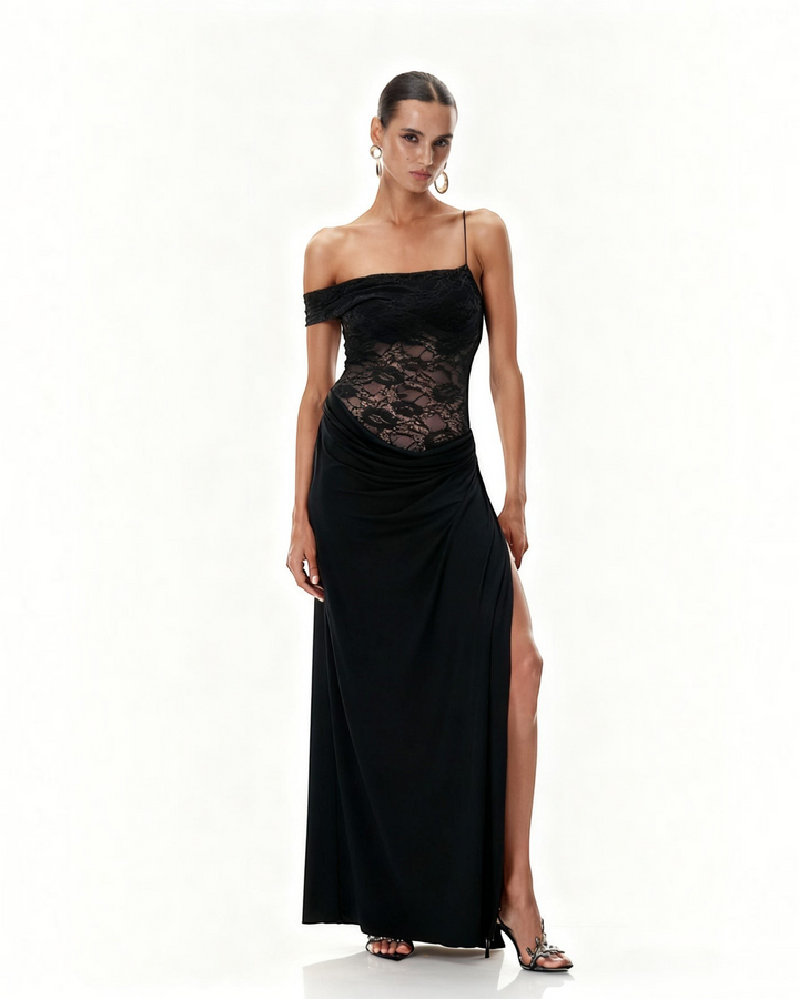 Luna Moda black one-shoulder maxi dress with a semi-sheer lace bodice, draped skirt, and high thigh slit.