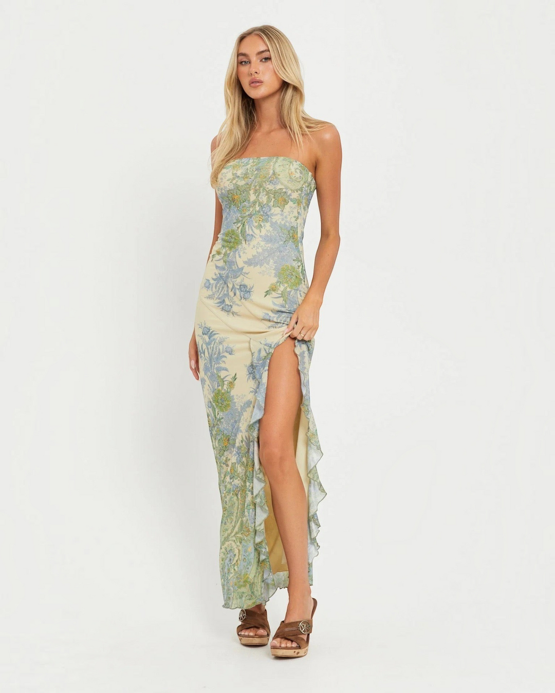 Luna Moda strapless maxi dress in pastel vintage floral print with a high thigh slit on a blonde model