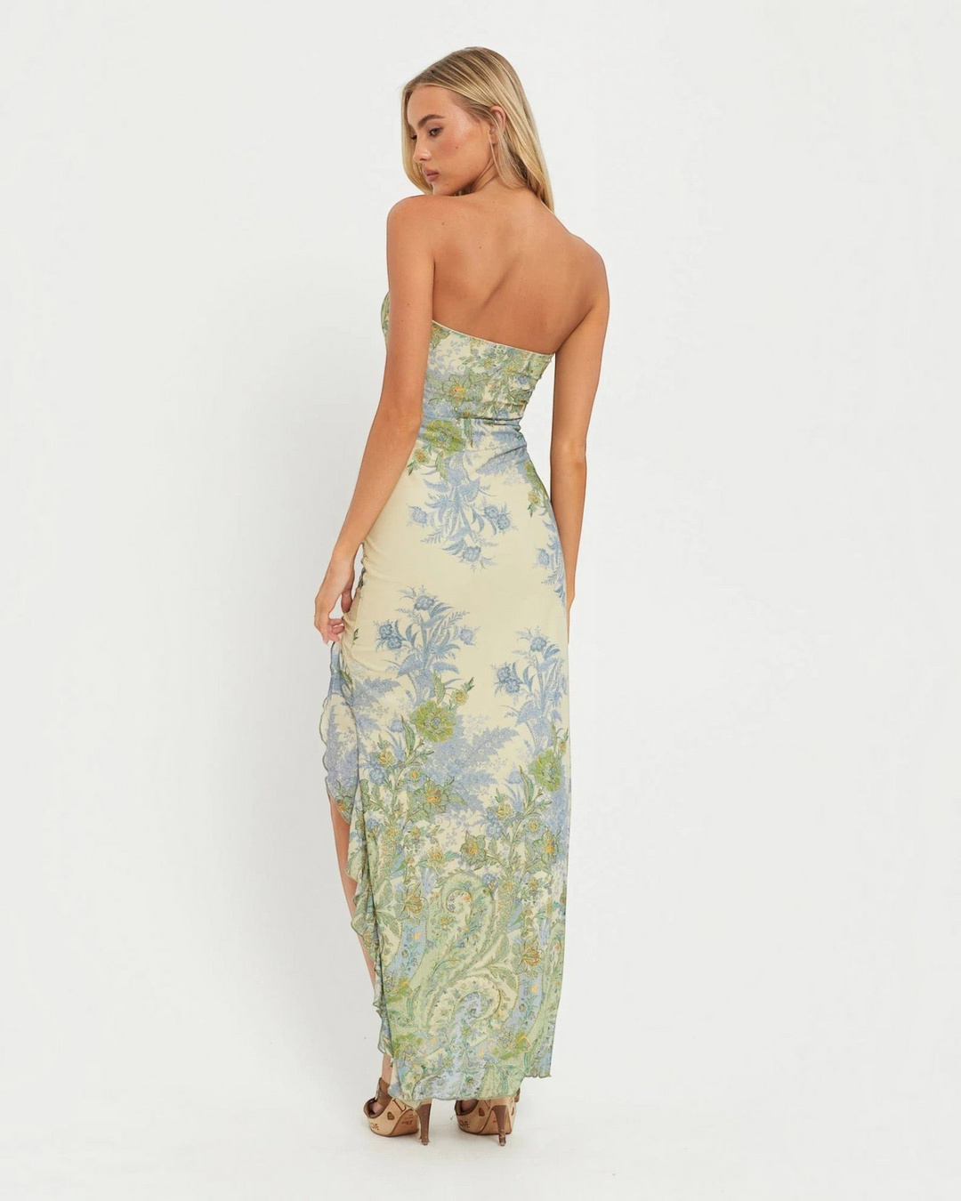 Luna Moda strapless maxi dress in vintage pastel floral print with a high thigh slit, viewed from the back.