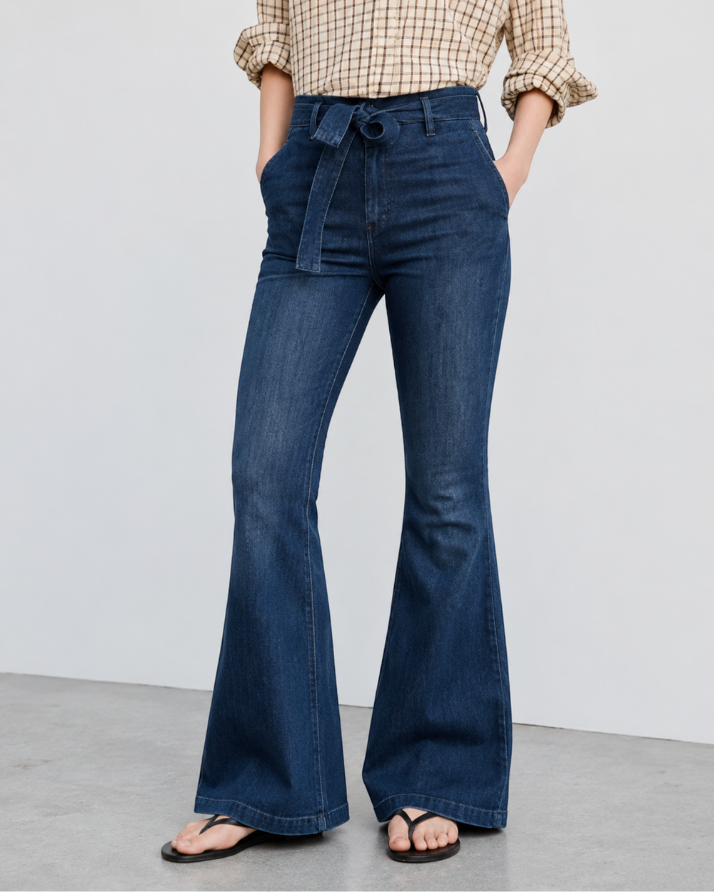 Luna Moda high-waisted flared denim jeans with a tie-waist belt and vintage-inspired silhouette