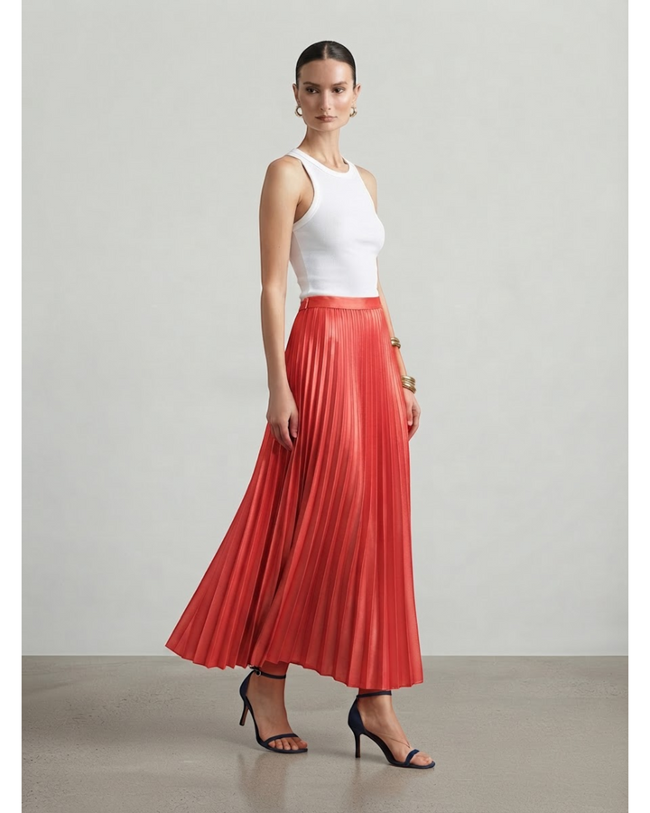 Luna Moda high-waisted red pleated maxi skirt worn with a white tank top and navy blue heeled sandals