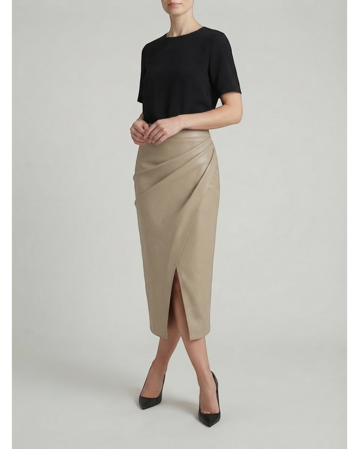 Luna Moda Natalie midi skirt in beige with draped detailing and a front slit, paired with a black top.
