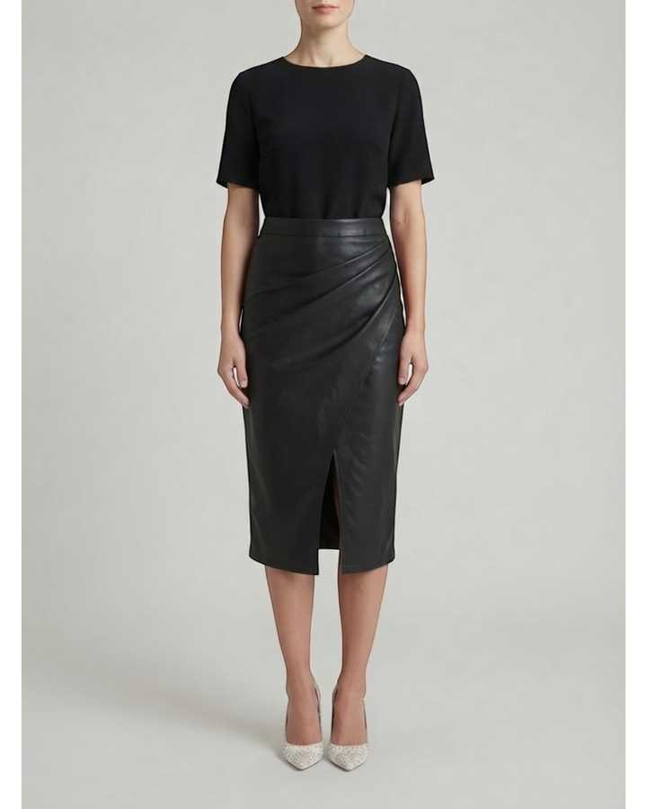 Luna Moda Natalie black midi skirt with draped design and front slit worn by a model with a black top