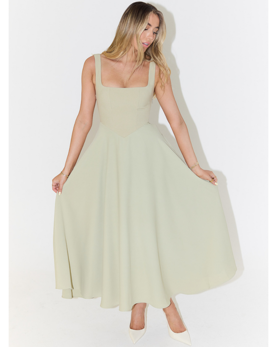 Luna Moda Scarlett Grace sage green midi dress with a square neckline and flared skirt worn by a blonde model