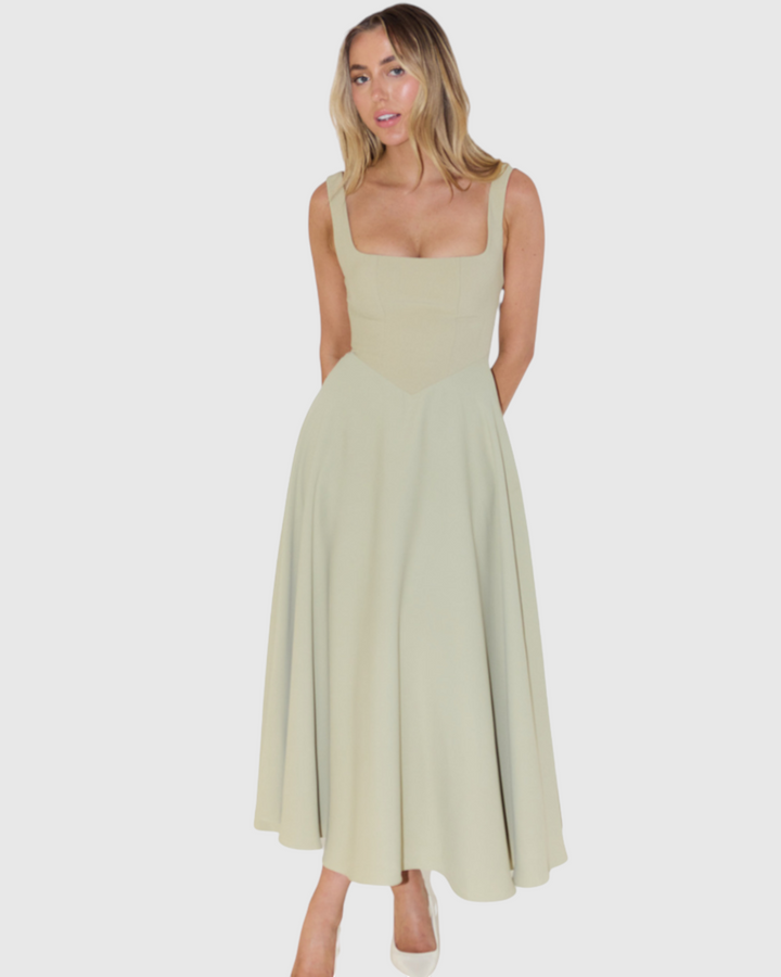 Luna Moda Scarlett Grace sage green midi dress with a square neckline and flared skirt worn by a blonde model