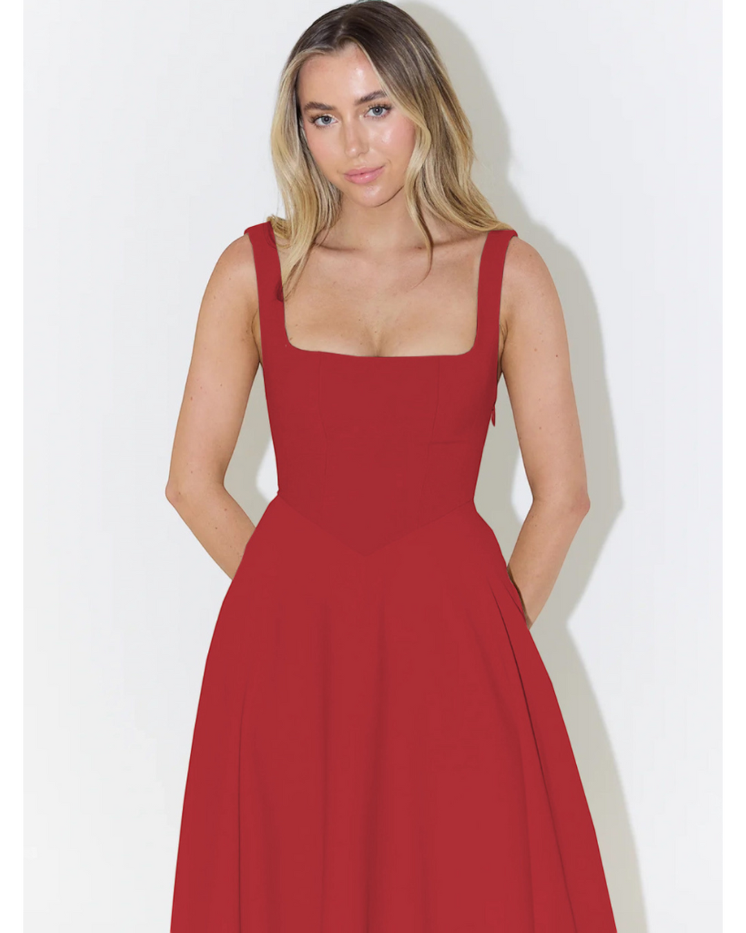 Luna Moda Scarlett Grace red midi dress with a square neckline and wide straps on a blonde model