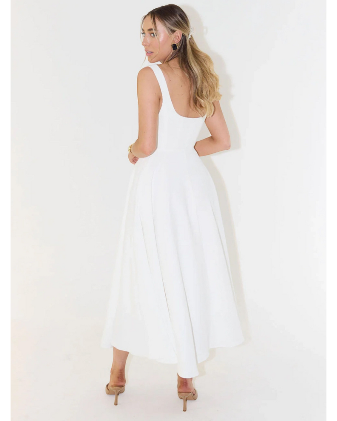 Luna Moda Scarlett Grace white midi dress with square neckline and flared skirt worn by a woman, back view.