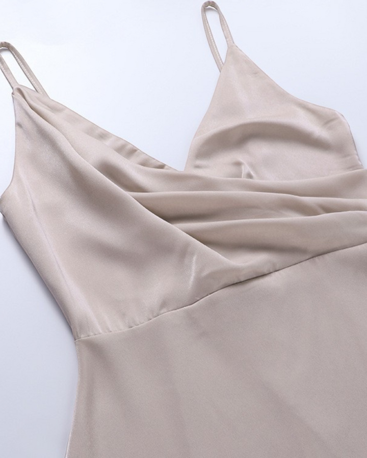 Luna Moda Aneta silk dress in champagne with a draped V-neckline and thin spaghetti straps