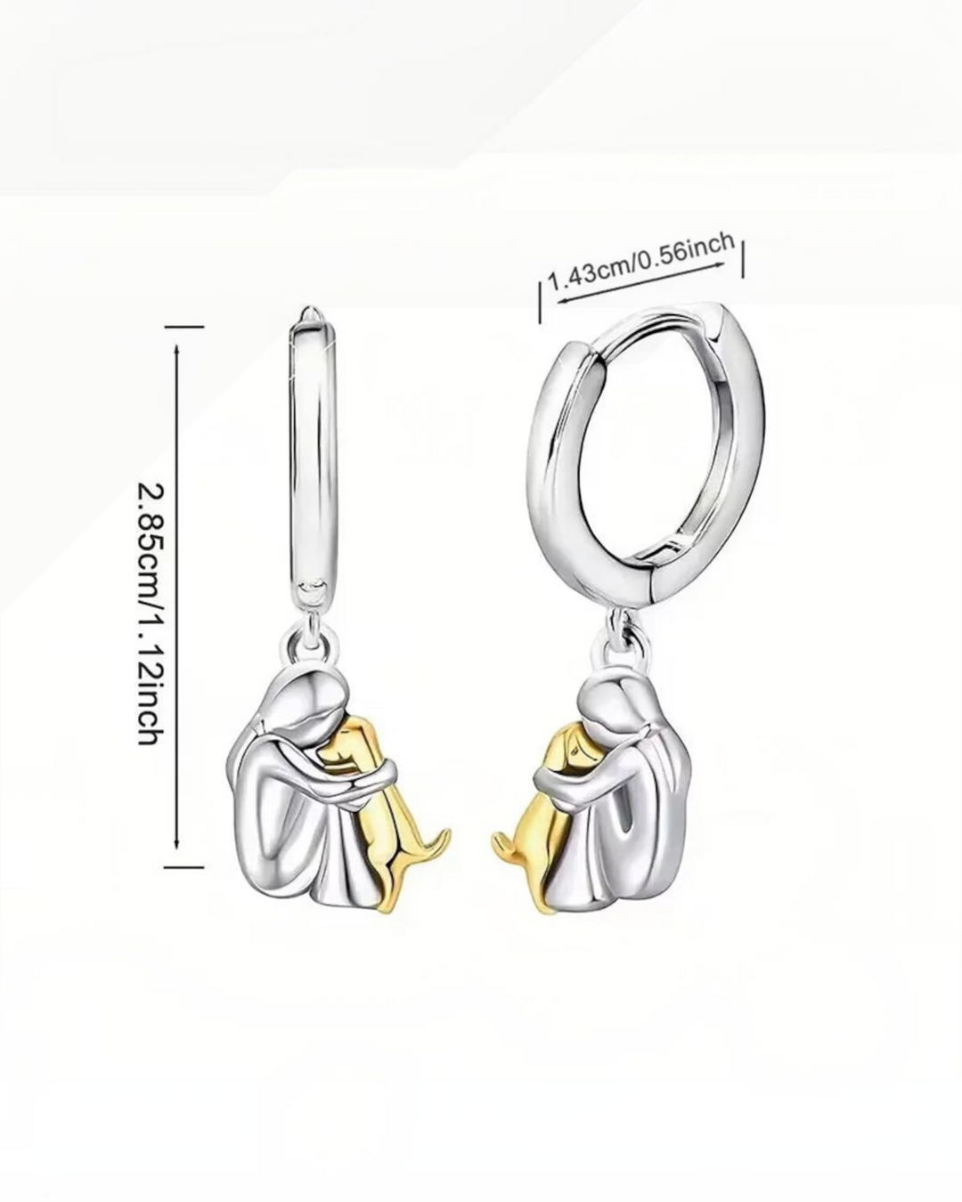 Luna Moda two-tone silver and gold hoop earrings featuring a person hugging a dog charm with measurement details.
