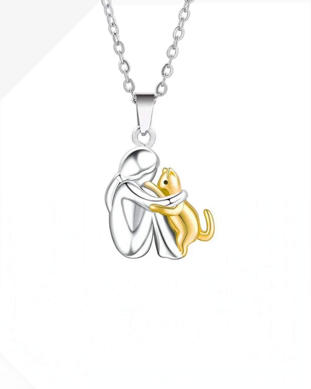 Luna Moda cat hug necklace featuring a silver human figure embracing a gold cat pendant on a 42 cm chain