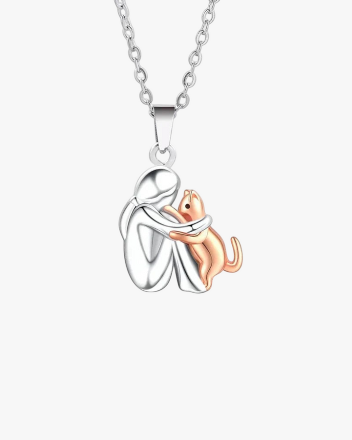 Luna Moda 42cm necklace featuring a silver and gold cat hug pendant symbolizing the bond between owner and pet.