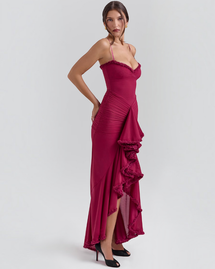 Luna Moda Edith burgundy maxi dress with spaghetti straps, ruched bodice, and a dramatic ruffled high-low hemline.