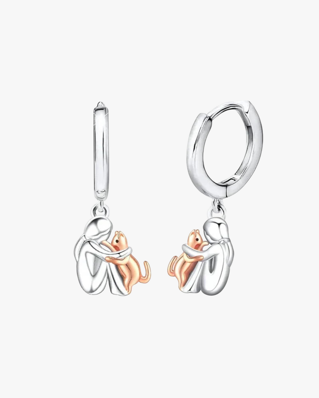 Luna Moda cat hug hoop earrings featuring a woman and cat design in silver and rose gold tones