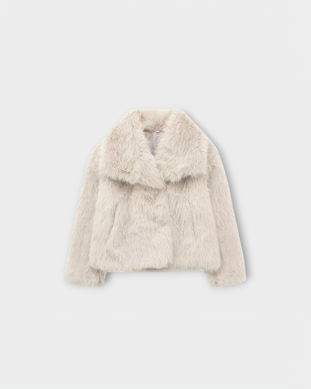 Luna Moda beige faux fur coat with a wide collar and soft texture, perfect for sophisticated winter layering.
