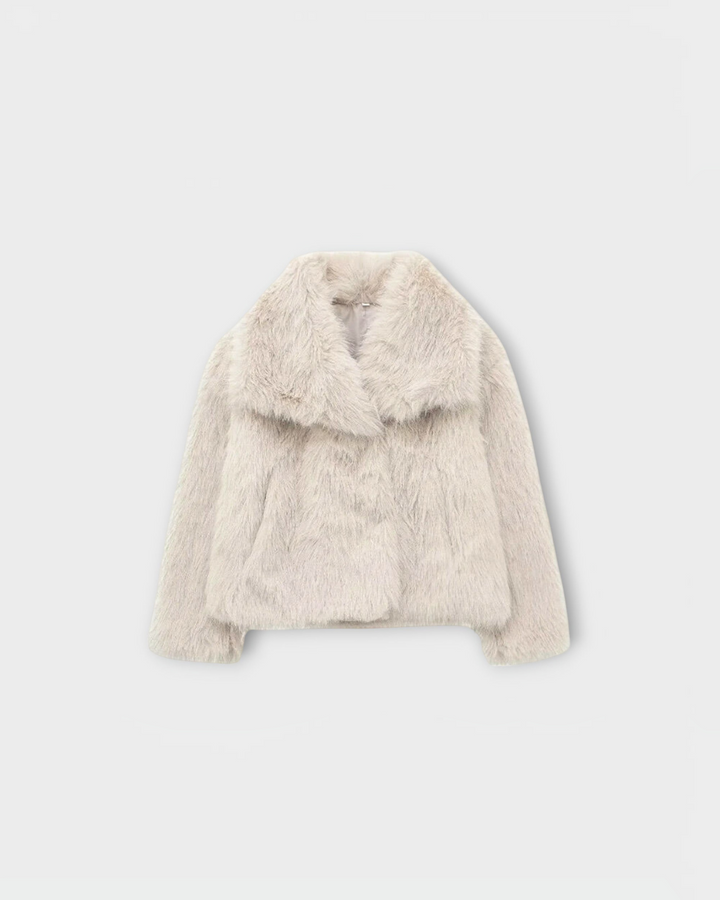 Luna Moda beige faux fur coat with a wide collar and soft texture, perfect for sophisticated winter layering.
