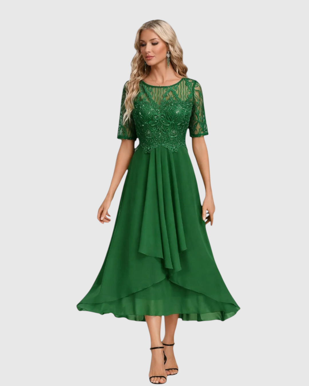Luna Moda Mariana midi dress in emerald green lace with short sleeves and a flowing skirt on a blonde model
