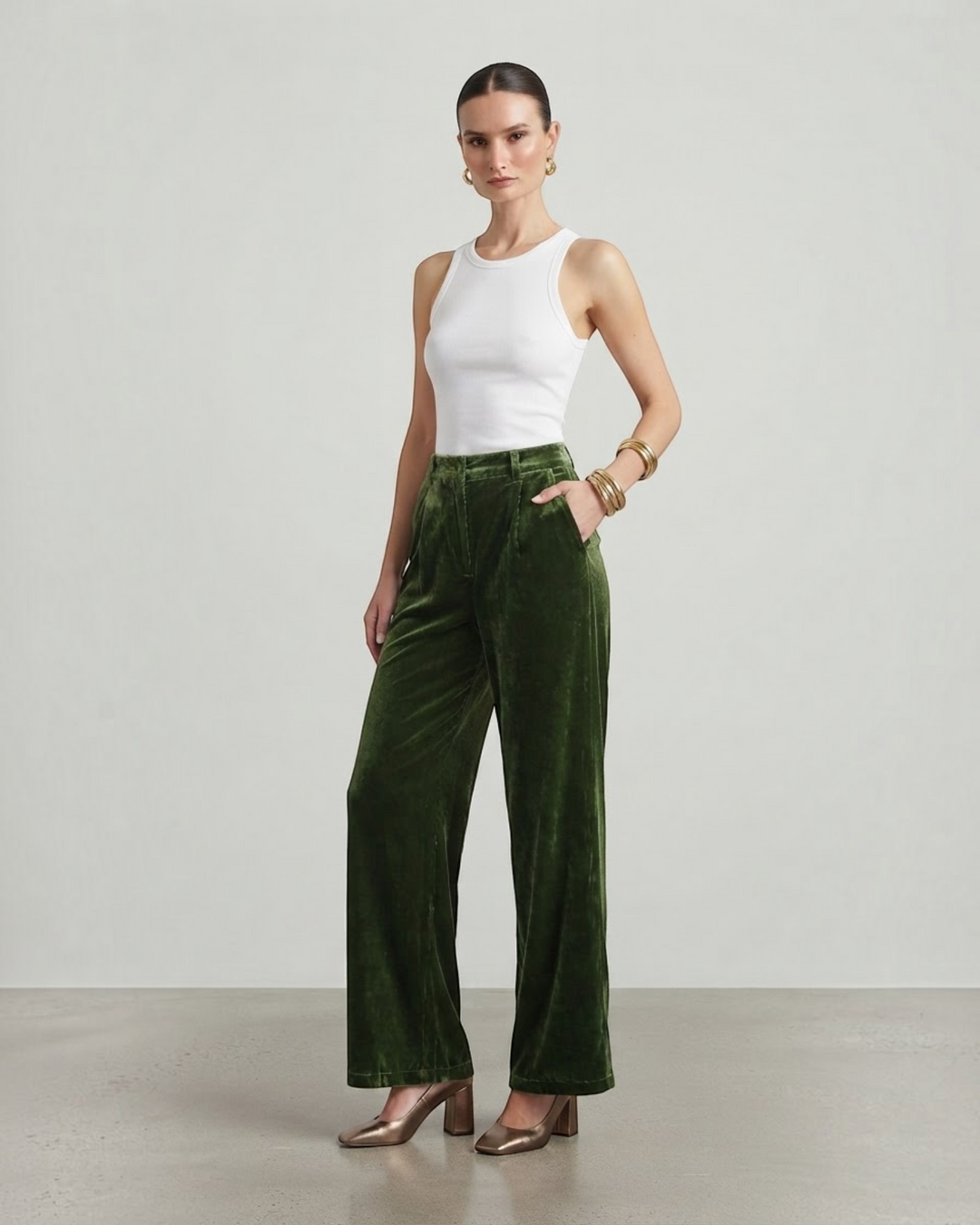 Luna Moda high-waisted wide-leg velvet trousers in deep green paired with a white tank top