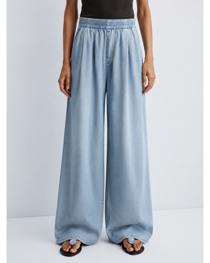 Luna Moda Zinna high-waisted light blue denim palazzo pants with an elasticated waistband and wide-leg fit.