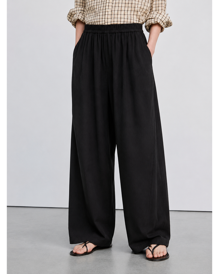 Luna Moda ZINNA high-waisted black palazzo trousers with a relaxed wide-leg fit and elasticated waistband.