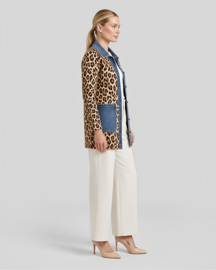 Luna Moda Nora long jacket featuring a leopard print body with blue denim collar and pockets on a model