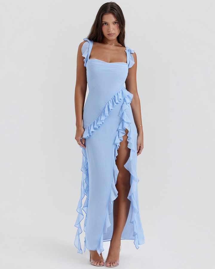 Luna Moda Andrea light blue maxi dress with ruffled trim, square neckline, and high side slit on a model.