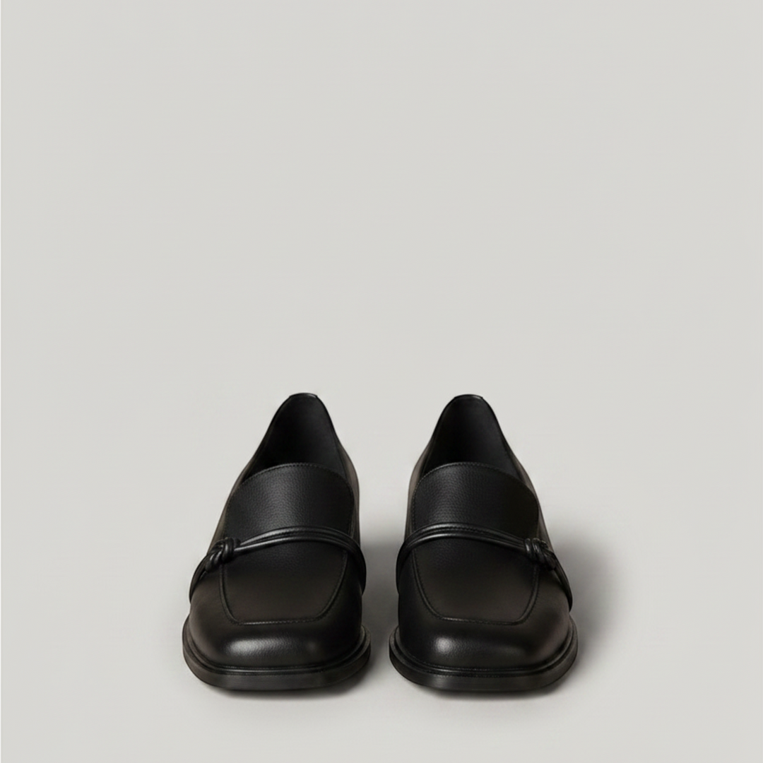 Luna Moda Aurea black leather loafers featuring a block heel and a delicate decorative bow on the upper