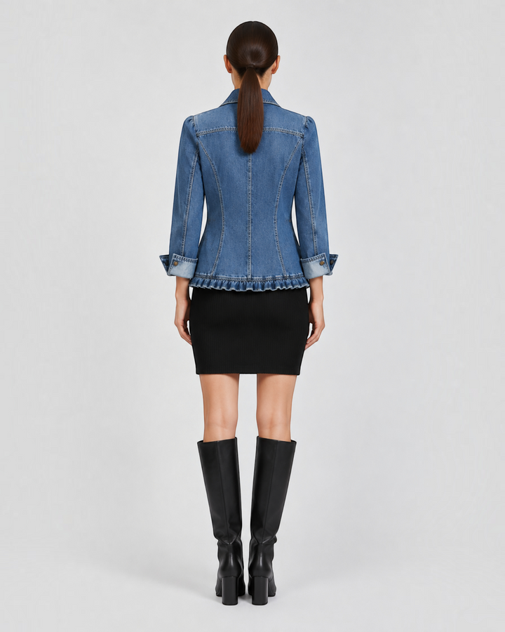 Back view of Luna Moda Fiorella denim jacket with ruffled hem, point collar, and adjustable sleeves on a model.