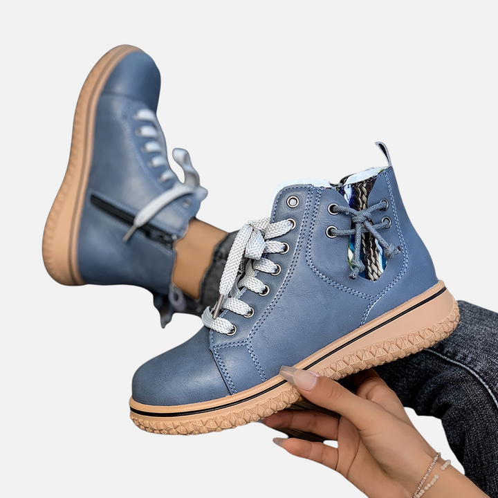 Luna Moda EDUARDA blue leather ankle boots with lace-up front, side zipper, and textured tan rubber sole.