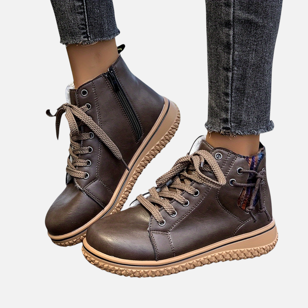 Luna Moda EDUARDA brown leather ankle boots with lace-up design and side zipper worn with grey jeans