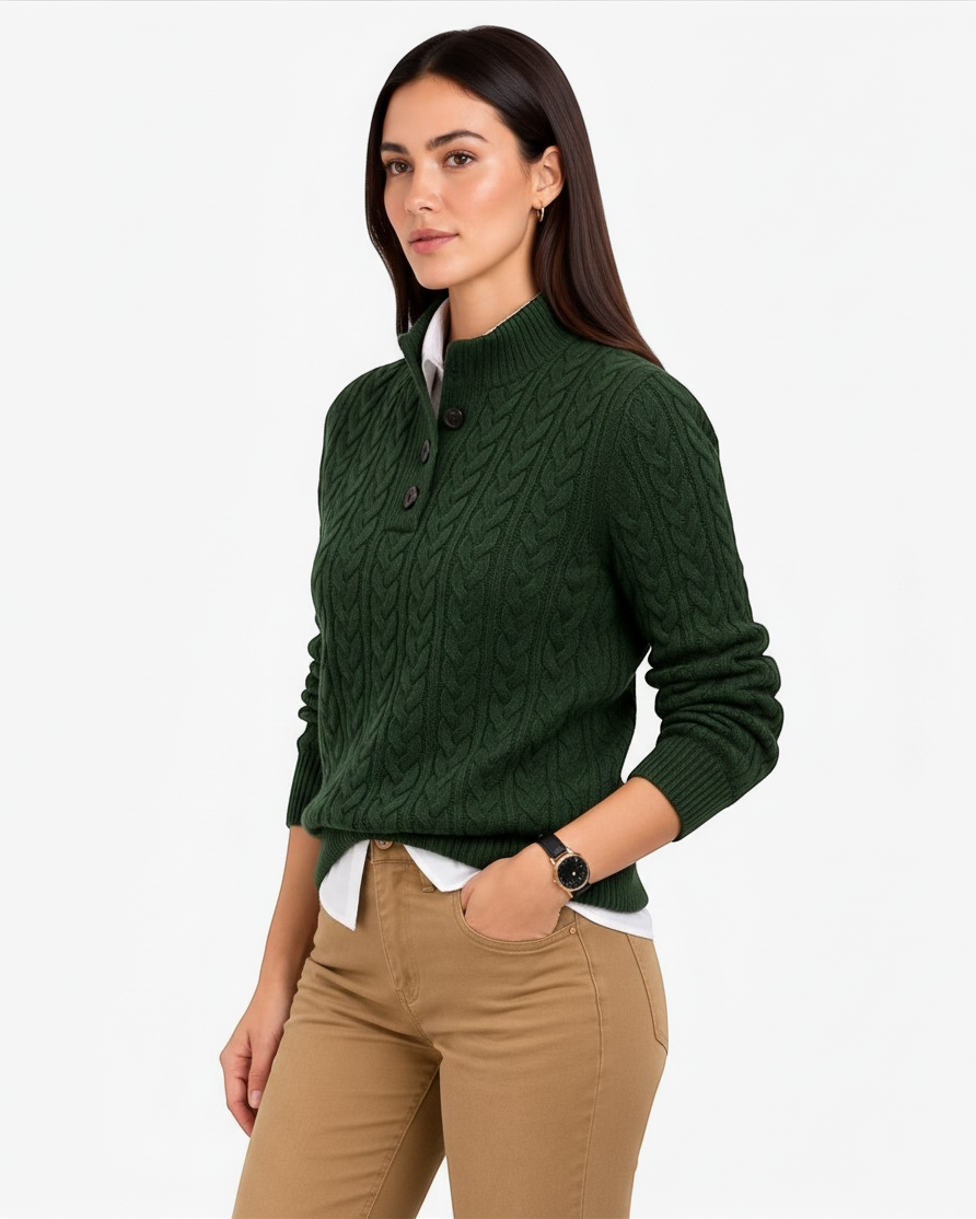 Luna Moda dark green cable knit sweater with high neck and button closure worn by a model over a white shirt