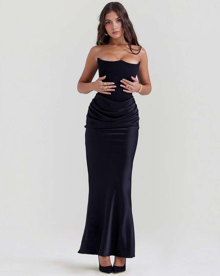 Luna Moda Serene black satin strapless evening gown with a draped waistline worn by a model on a neutral background