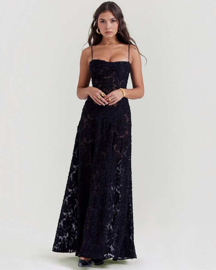 Luna Moda black floral maxi dress with sweetheart neckline and spaghetti straps worn by a model