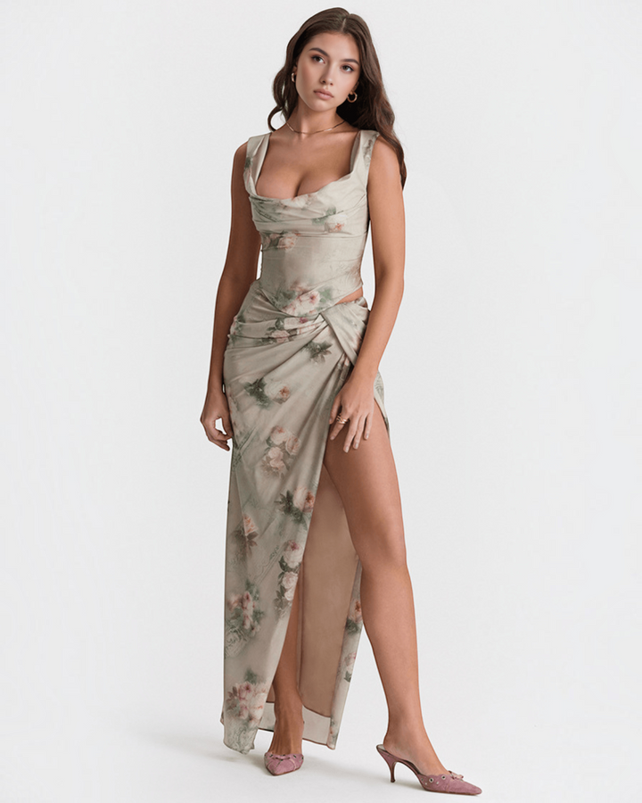 Luna Moda floral corset dress with a draped neckline, high side slit, and midi length worn by a model